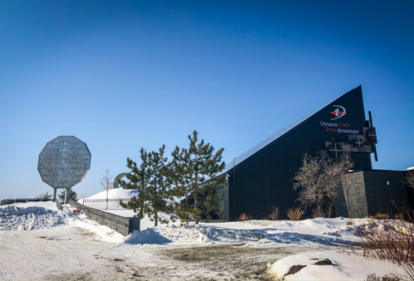 exterior of Dynamic Earth and The Big Nickel in winter time