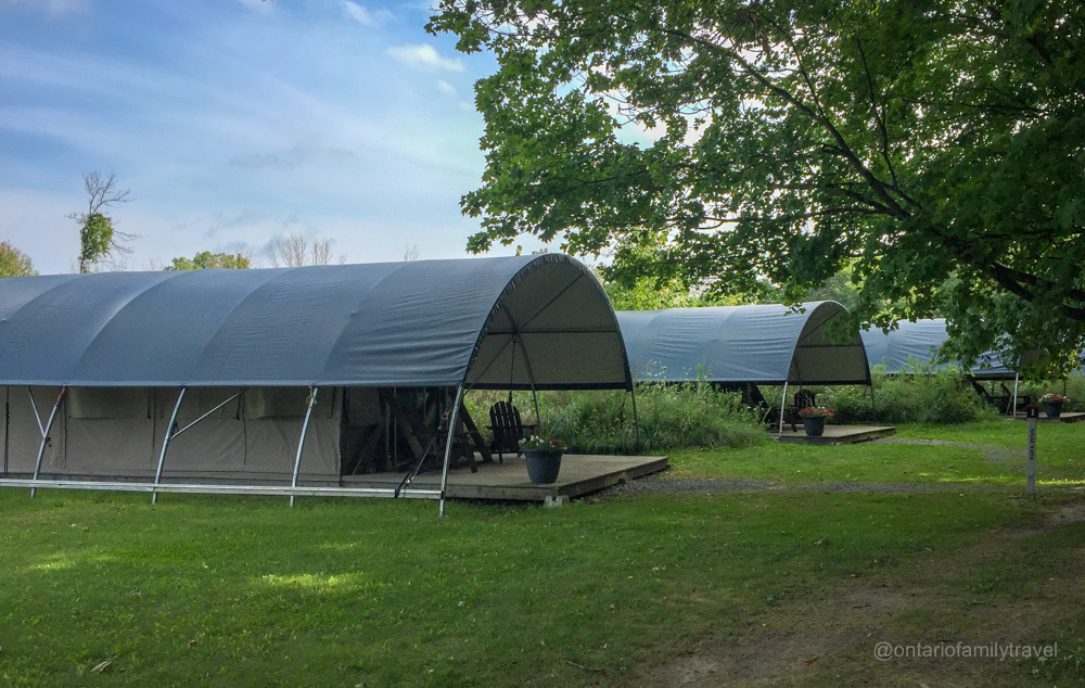 Row of Luxury Safari glamping tents Exterior Long Point Eco Adventures